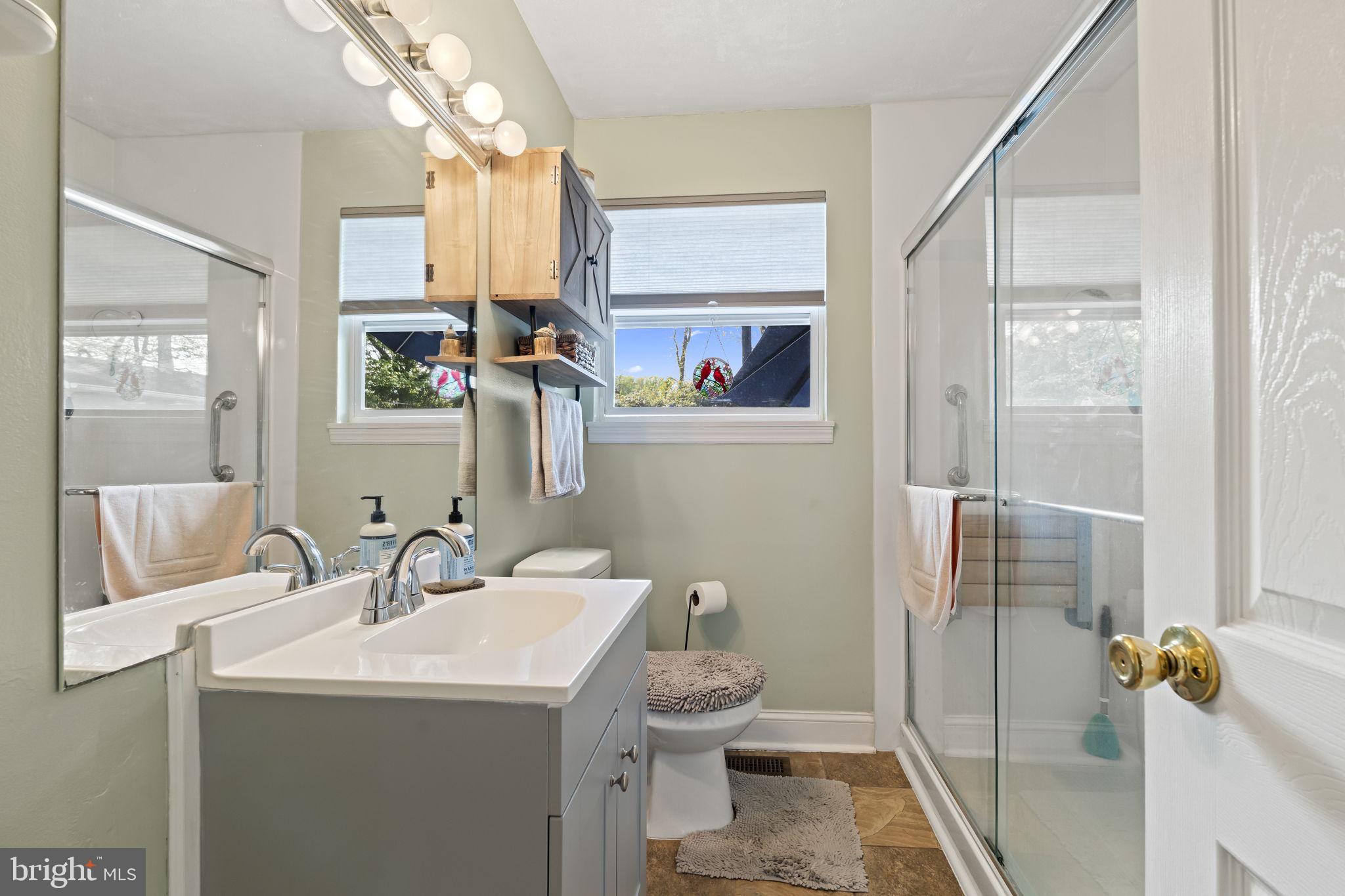 436 Carver Avenue Lawnside, NJ 08045 - Photo 17 of 32 a bathroom with a sink toilet and shower