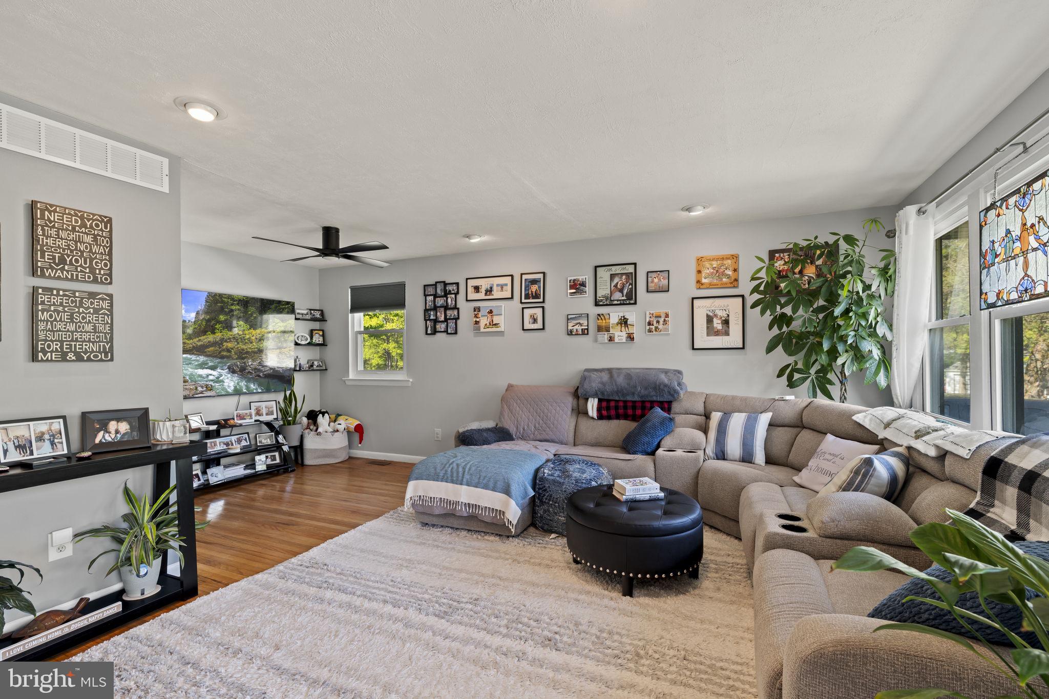 436 Carver Avenue Lawnside, NJ 08045 - Photo 5 of 32 a living room with furniture or couch and a wooden floor