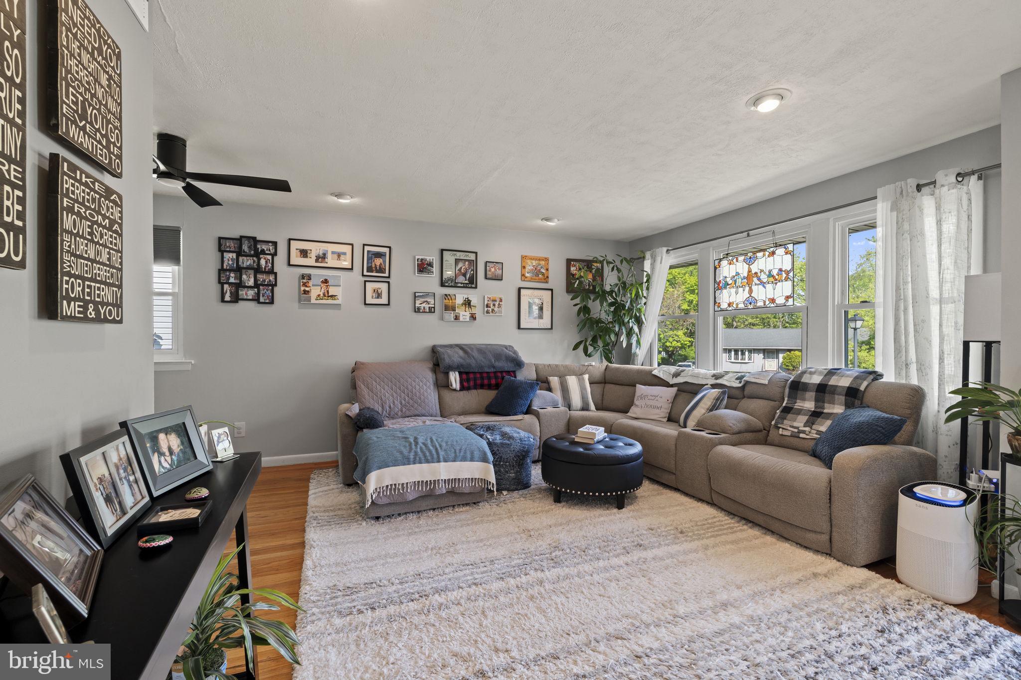 436 Carver Avenue Lawnside, NJ 08045 - Photo 7 of 32 a living room with furniture and a large window