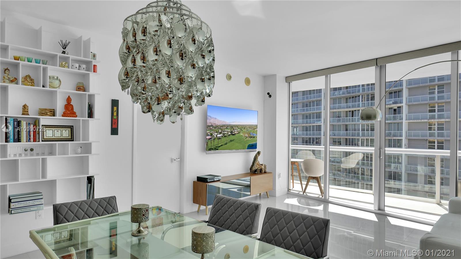 475 Brickell Avenue, Unit 5109 Miami, FL 33131 - Photo 3 of 31 a living room with furniture and a potted plant