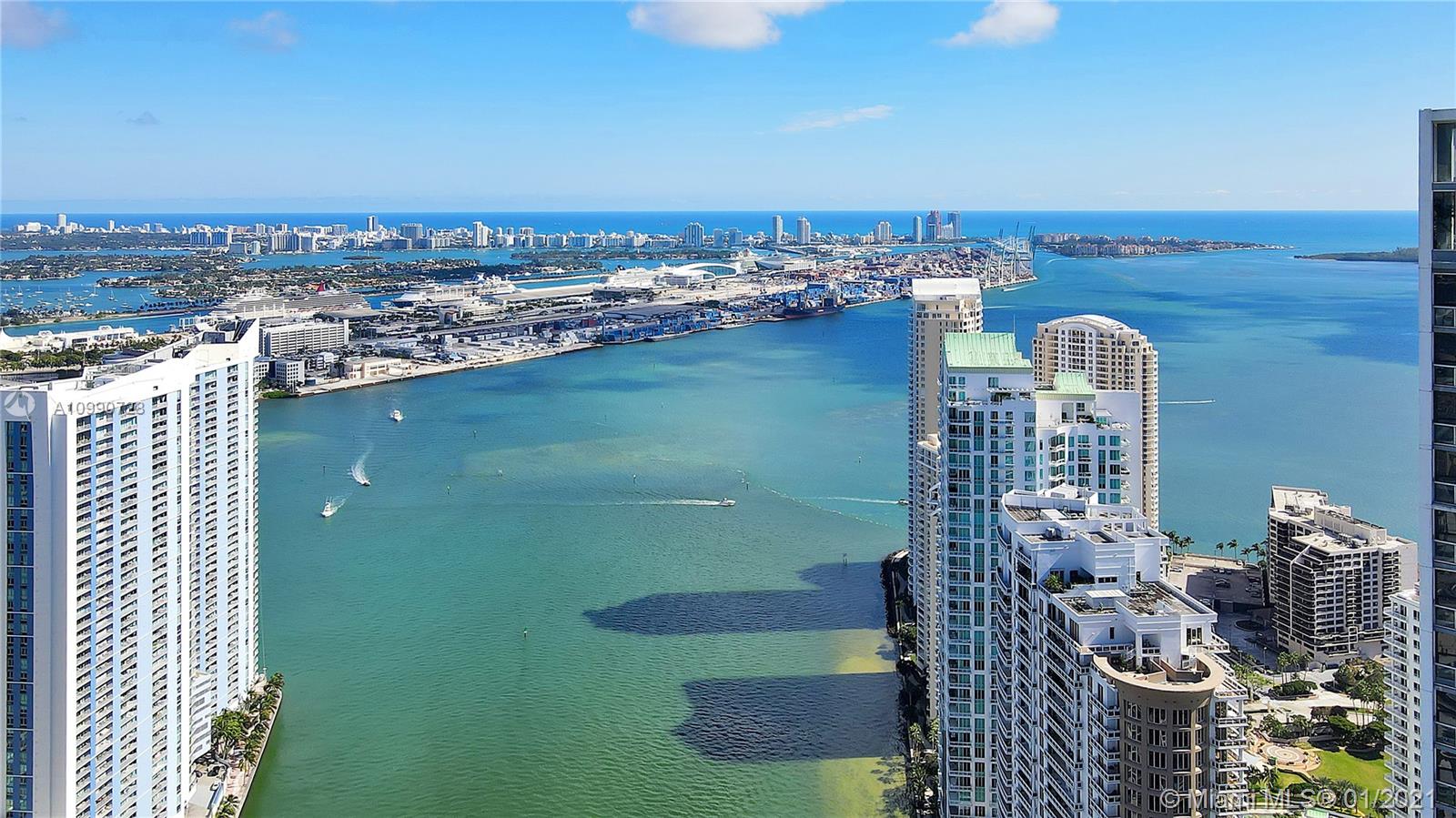 475 Brickell Avenue, Unit 5109 Miami, FL 33131 - Photo 25 of 31 a view of a lake with tall buildings