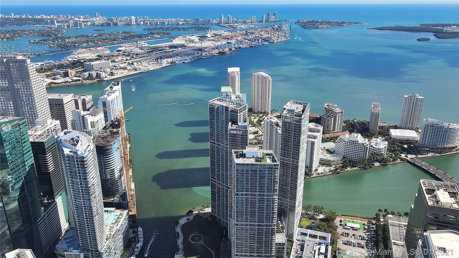 475 Brickell Avenue, Unit 5109 Miami, FL 33131 - Photo 28 of 31 a view of a lake with a house