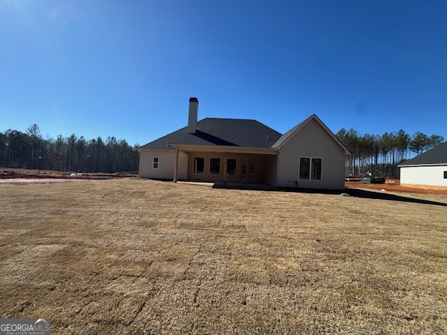 230 Tattersall Way Senoia, GA 30276 - Photo 3 of 3 a front view of a house with a yard