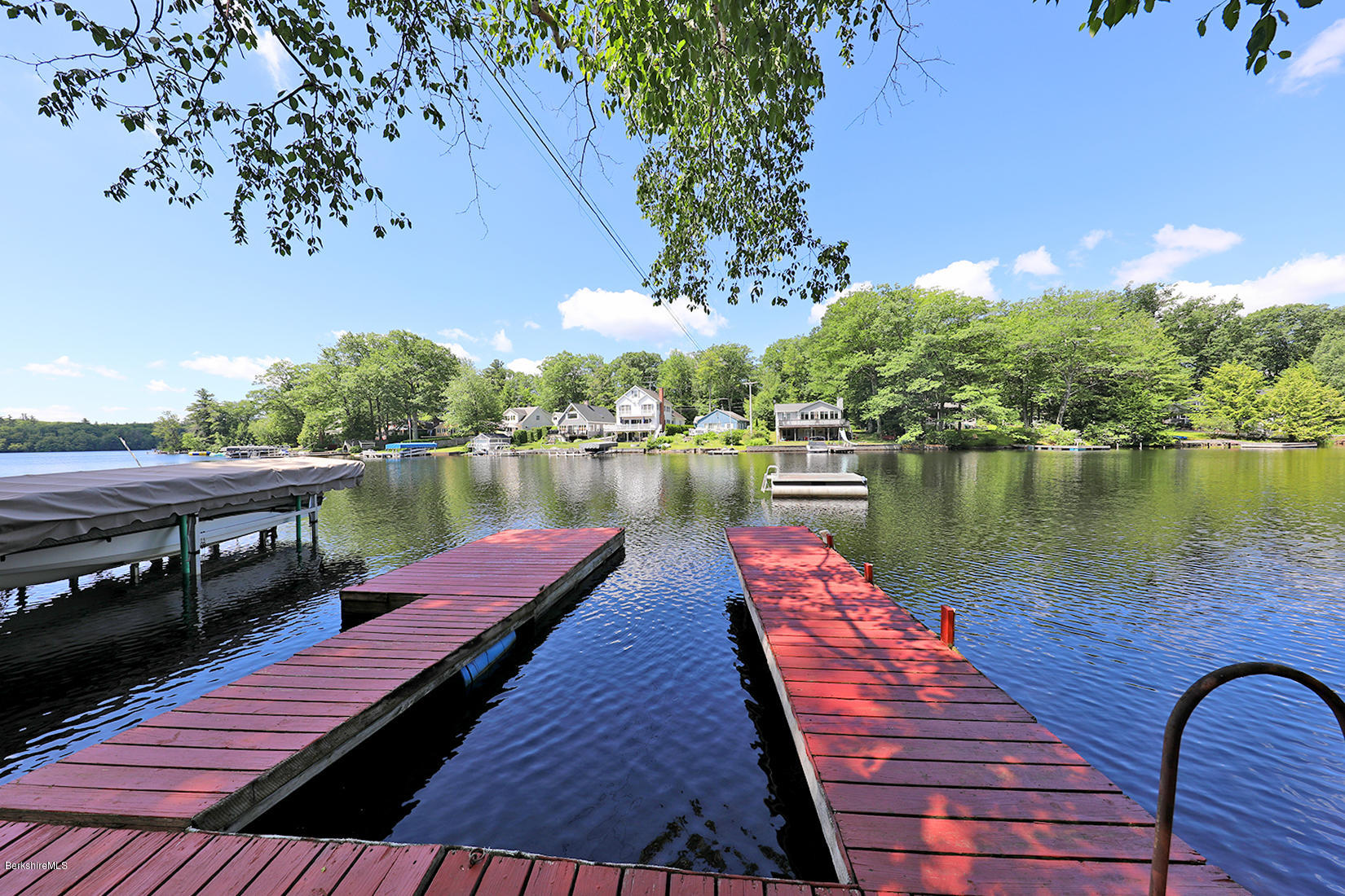 142 Kibbe Road Otis, MA 01029 - Photo 2 of 28 swimming pool view with a lake view