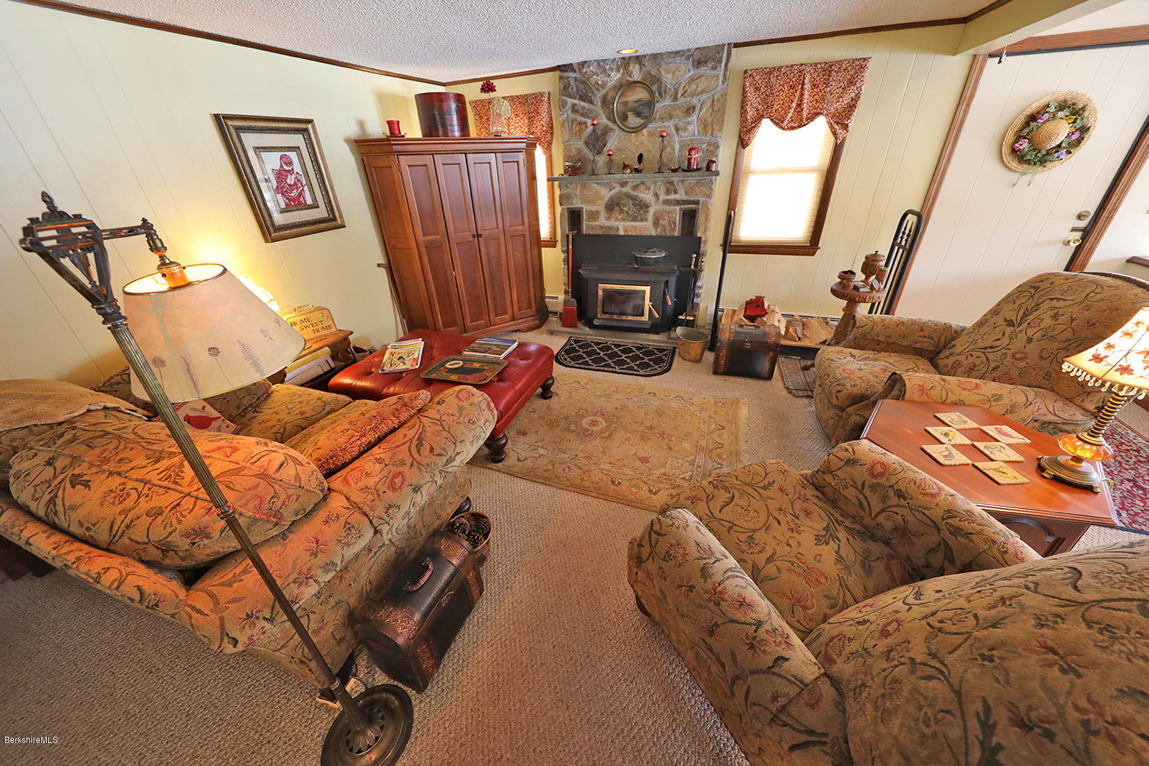 142 Kibbe Road Otis, MA 01029 - Photo 13 of 28 a bedroom with furniture and a fireplace
