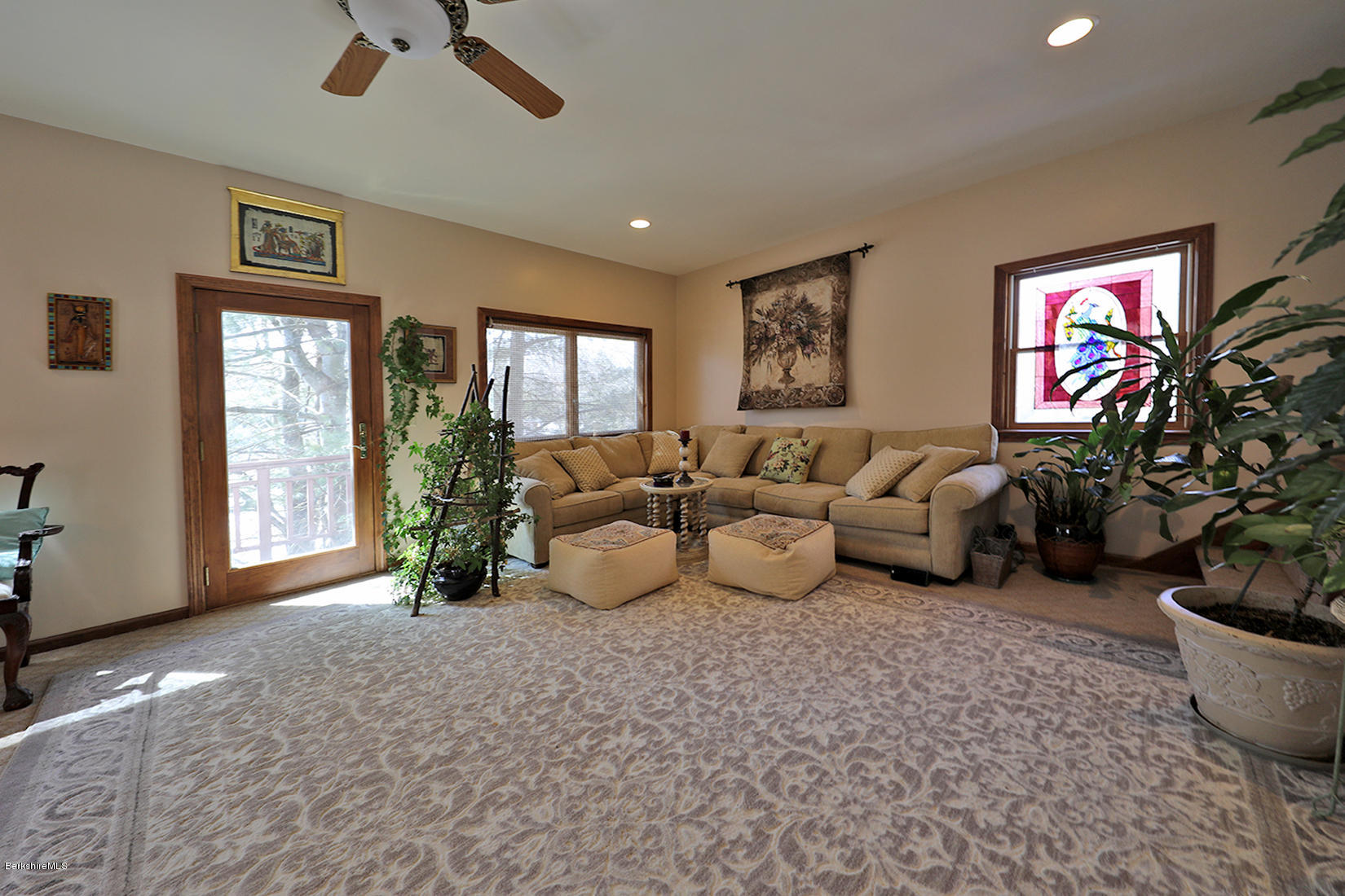 142 Kibbe Road Otis, MA 01029 - Photo 21 of 28 a living room with furniture and a potted plant