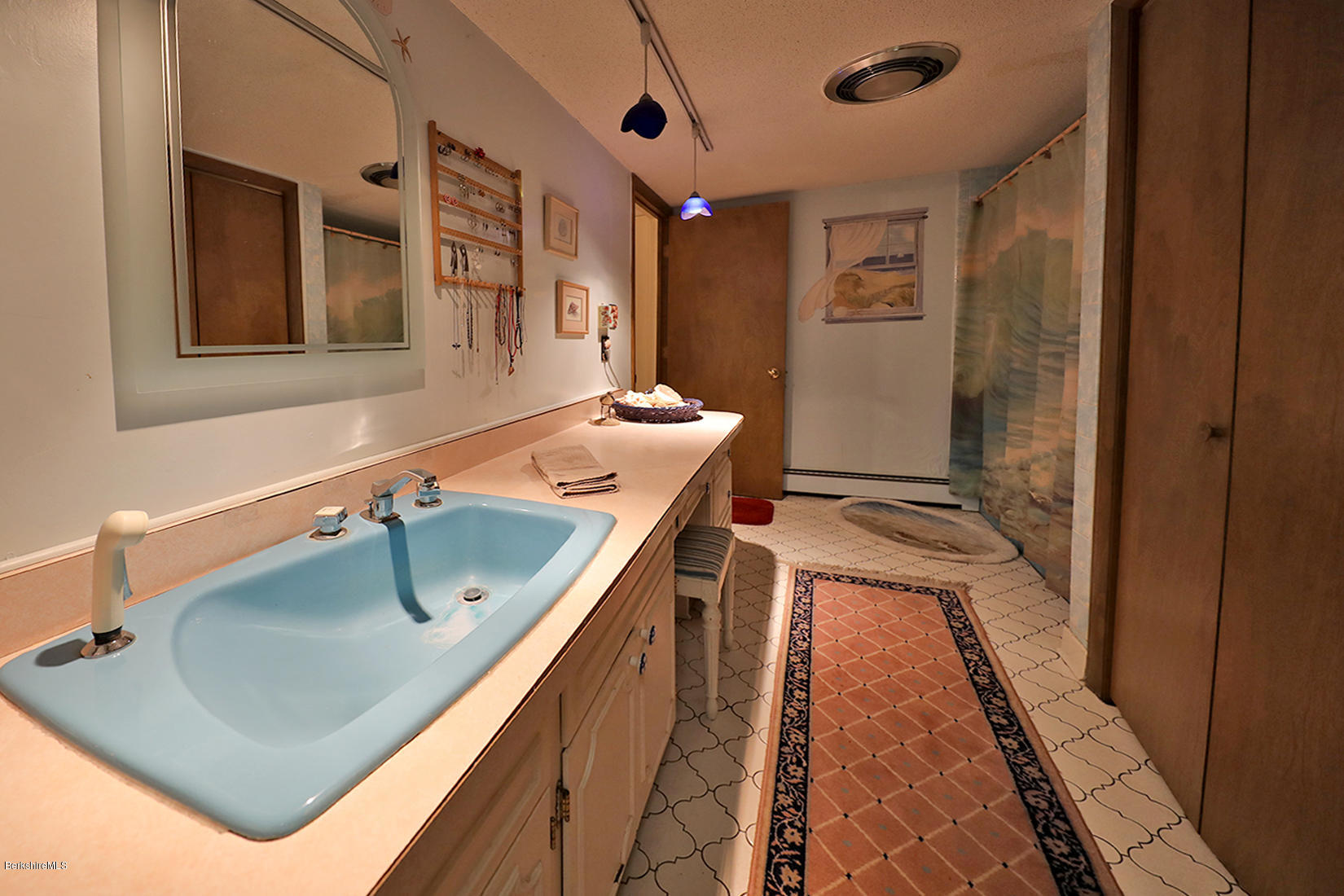 142 Kibbe Road Otis, MA 01029 - Photo 23 of 28 a bathroom with a sink and a tub