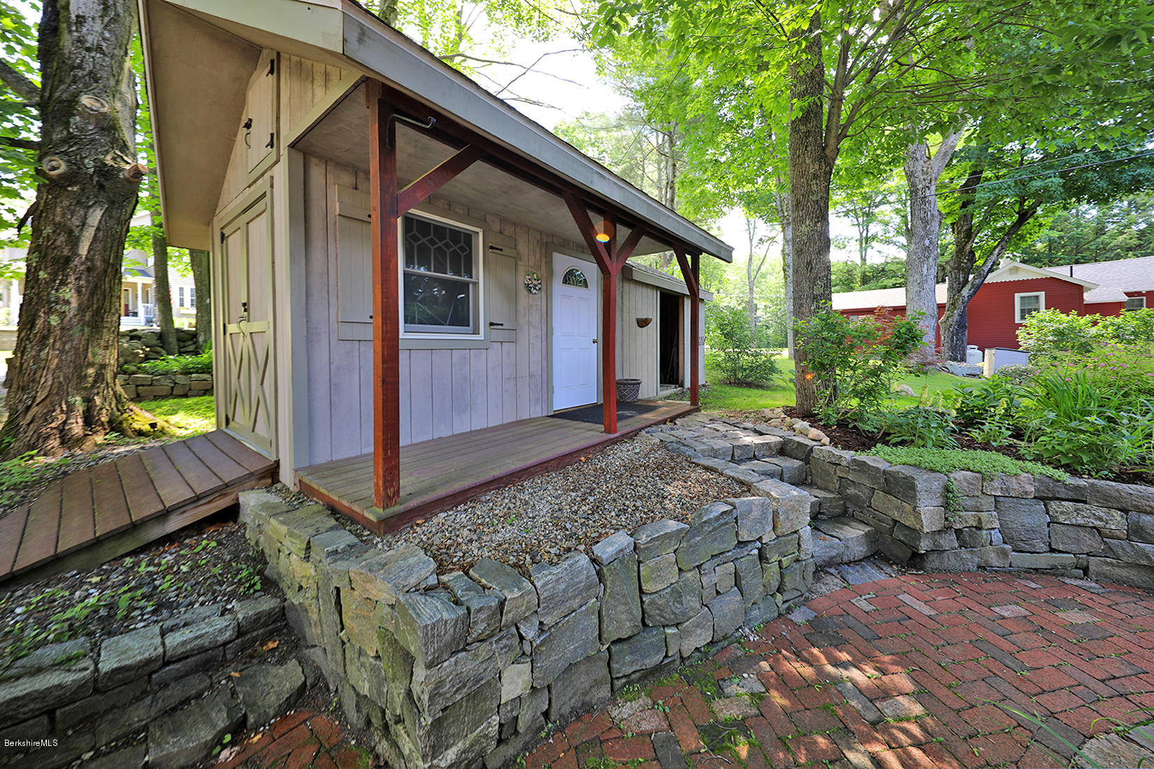 142 Kibbe Road Otis, MA 01029 - Photo 26 of 28 a front view of a house with garden