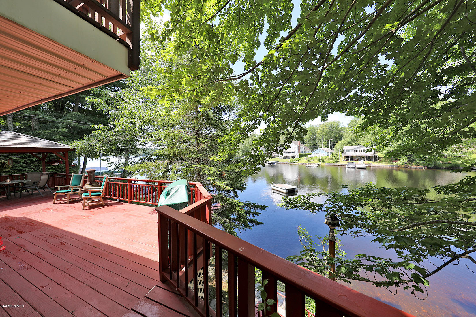 142 Kibbe Road Otis, MA 01029 - Photo 28 of 28 a balcony view with two chairs and a table