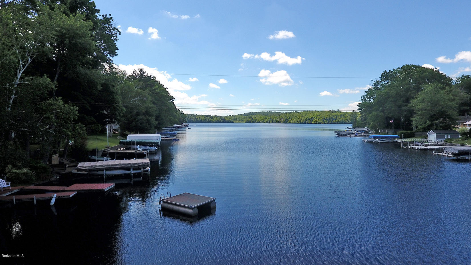 142 Kibbe Road Otis, MA 01029 - Photo 4 of 28 a view of a lake with outdoor space