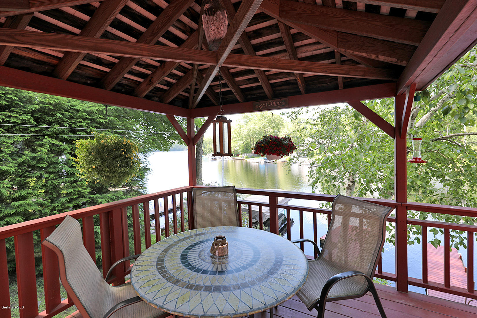 142 Kibbe Road Otis, MA 01029 - Photo 7 of 28 a view of a chair and table in the balcony