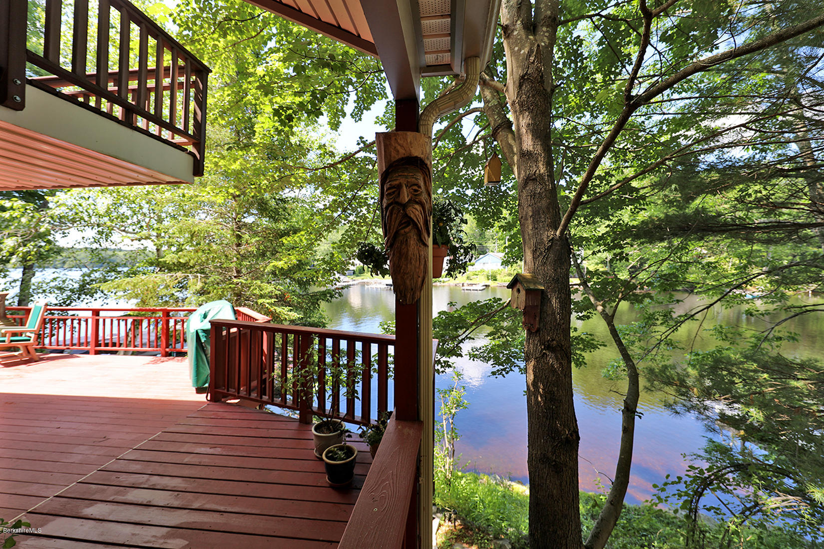 142 Kibbe Road Otis, MA 01029 - Photo 8 of 28 a view of a balcony with wooden floor