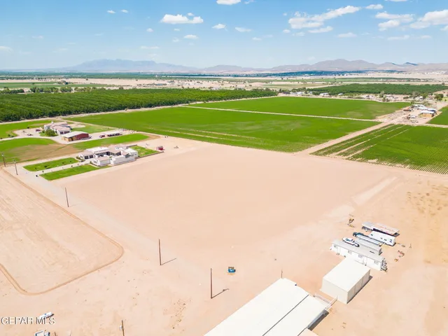 a view of a swimming pool and an outdoor space