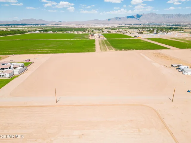 a view of an swimming pool and a yard