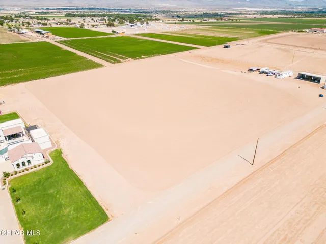 a view of a swimming pool and an outdoor space