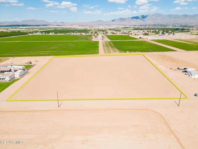 a view of an swimming pool and a yard