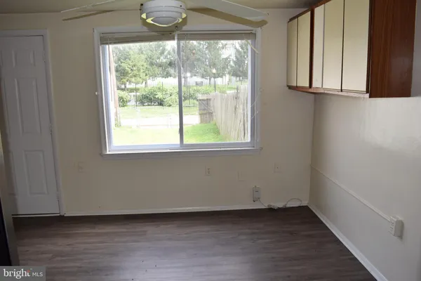 a view of a window in an empty room