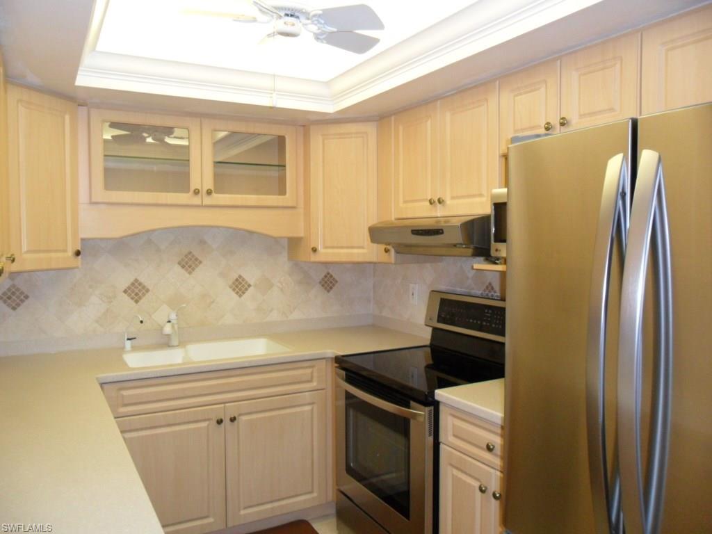 159 Teryl Road, Unit E2 Naples, FL 34112 - Photo 3 of 16 remodeled kitchen