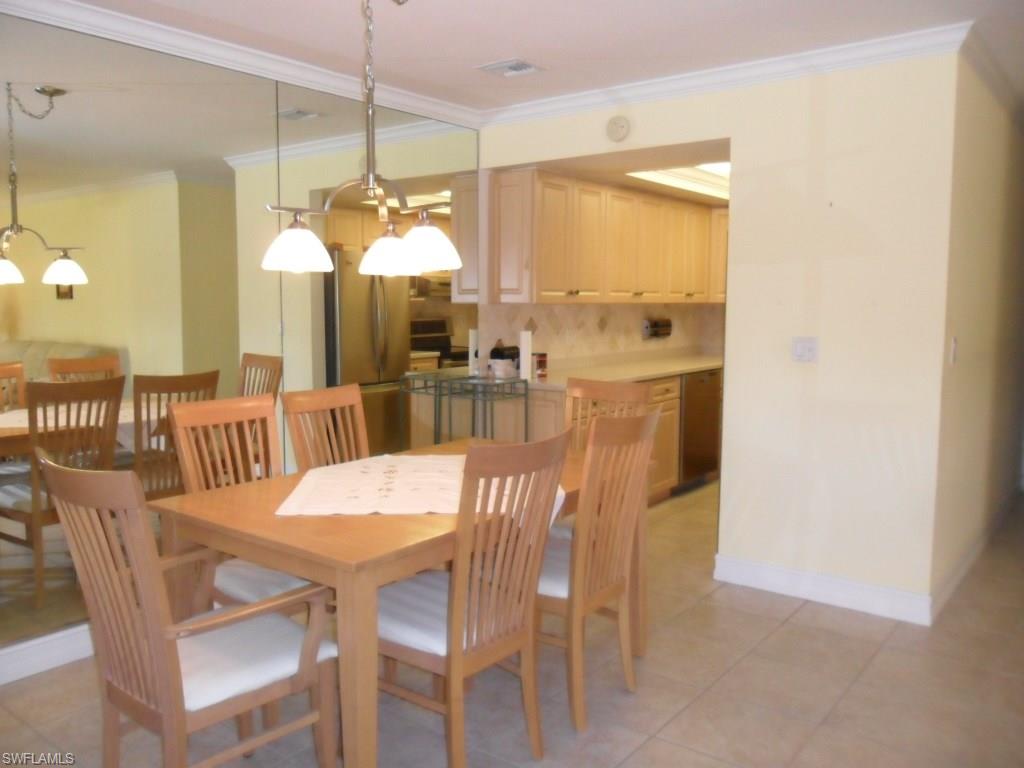 159 Teryl Road, Unit E2 Naples, FL 34112 - Photo 5 of 16 dining area