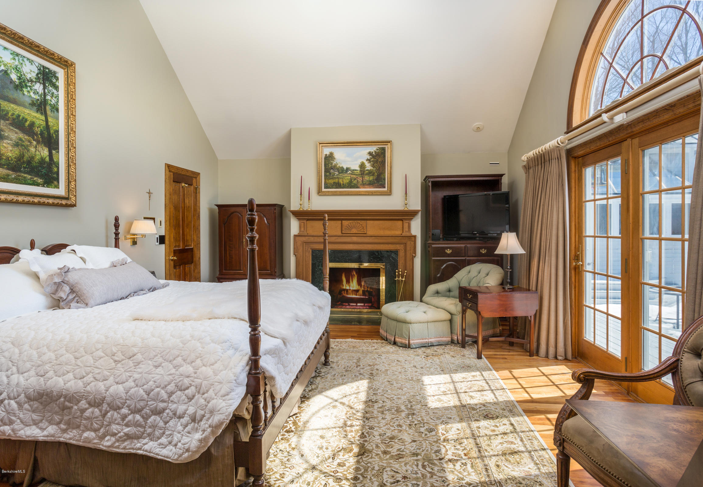 215 Devon Road Lee, MA 01238 - Photo 17 of 59 a bedroom with furniture and a fireplace