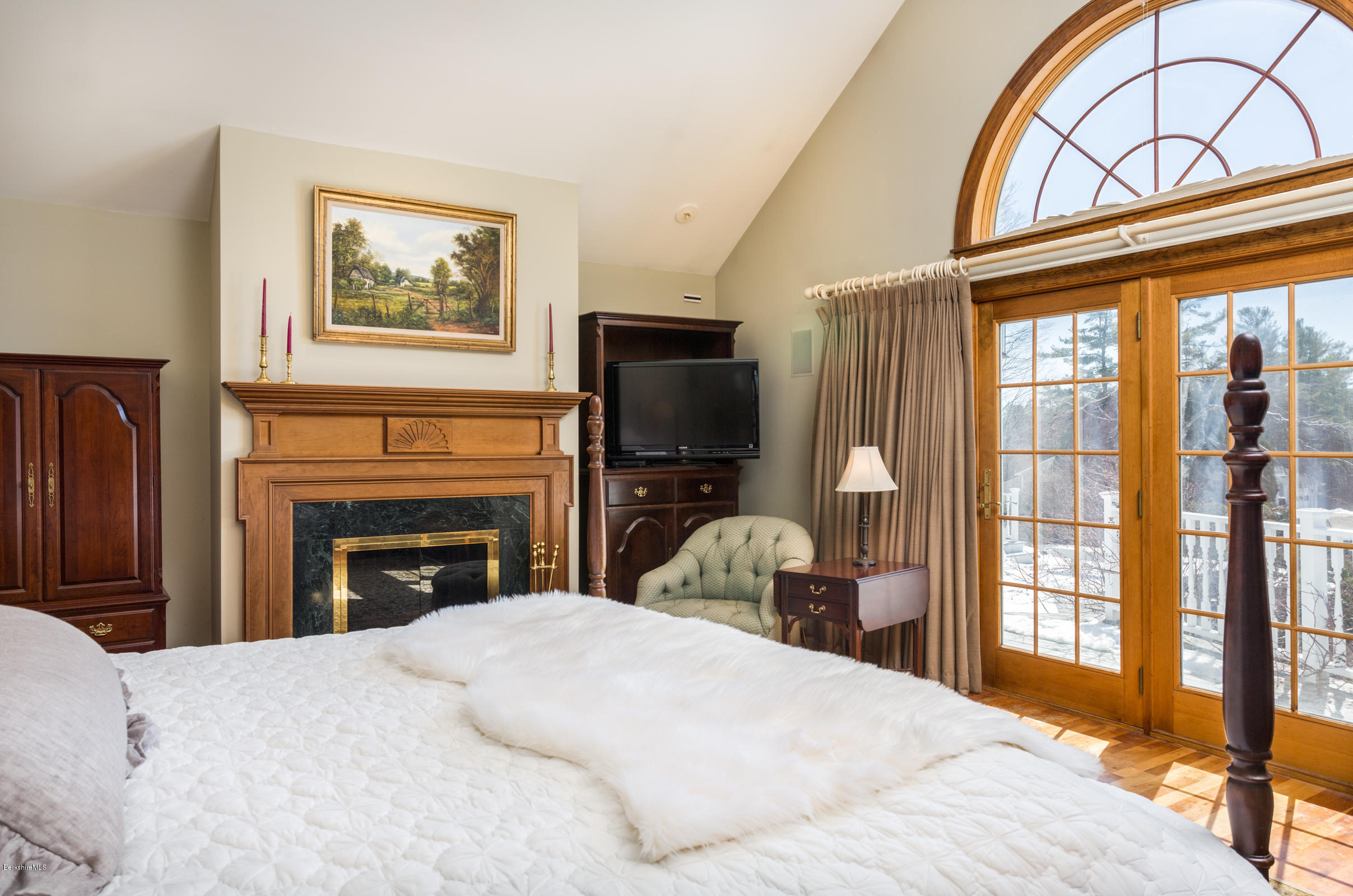215 Devon Road Lee, MA 01238 - Photo 19 of 59 a bedroom with a bed and a large window with outer view