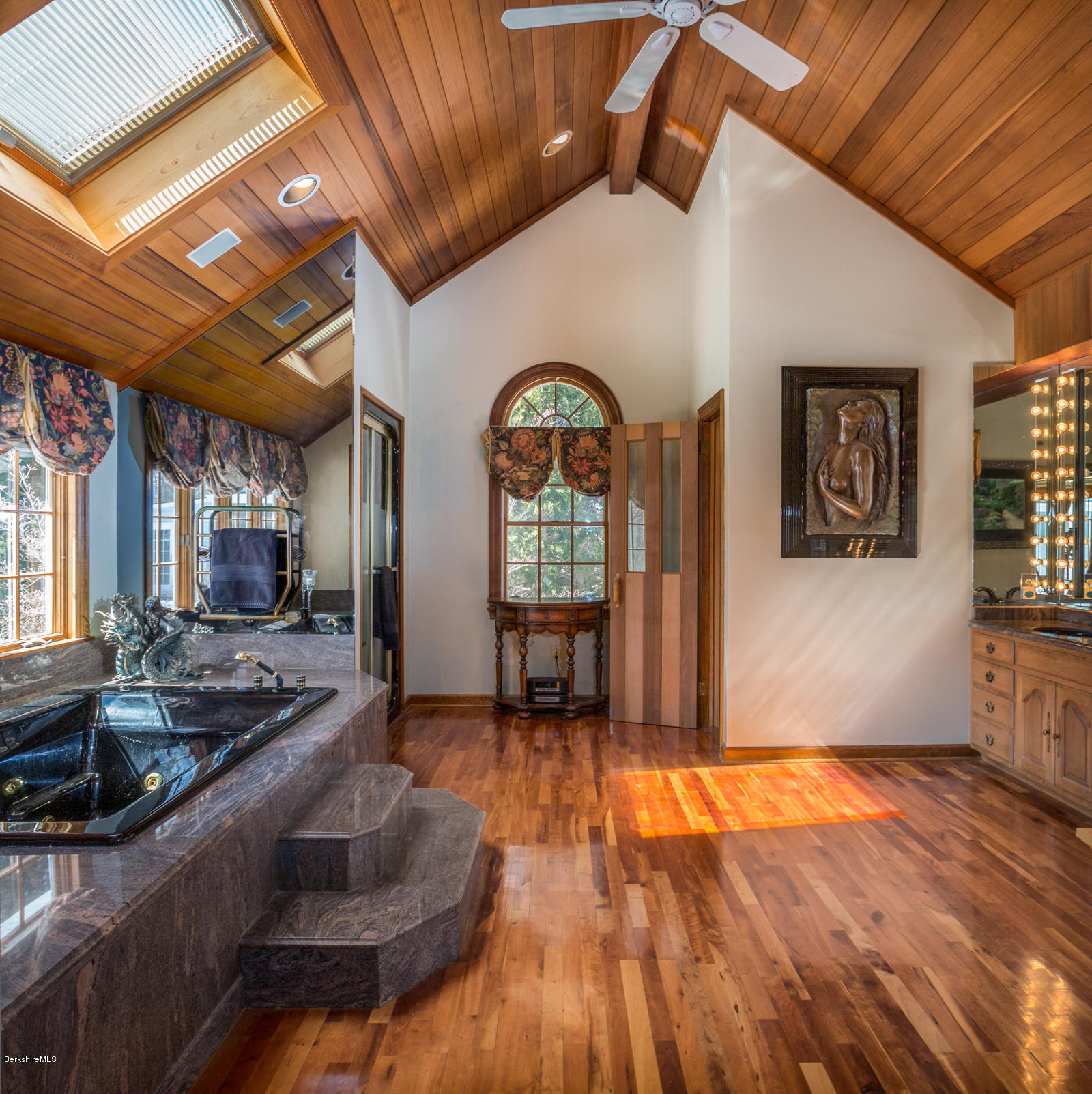 215 Devon Road Lee, MA 01238 - Photo 23 of 59 a view of a living room and kitchen with wooden floors