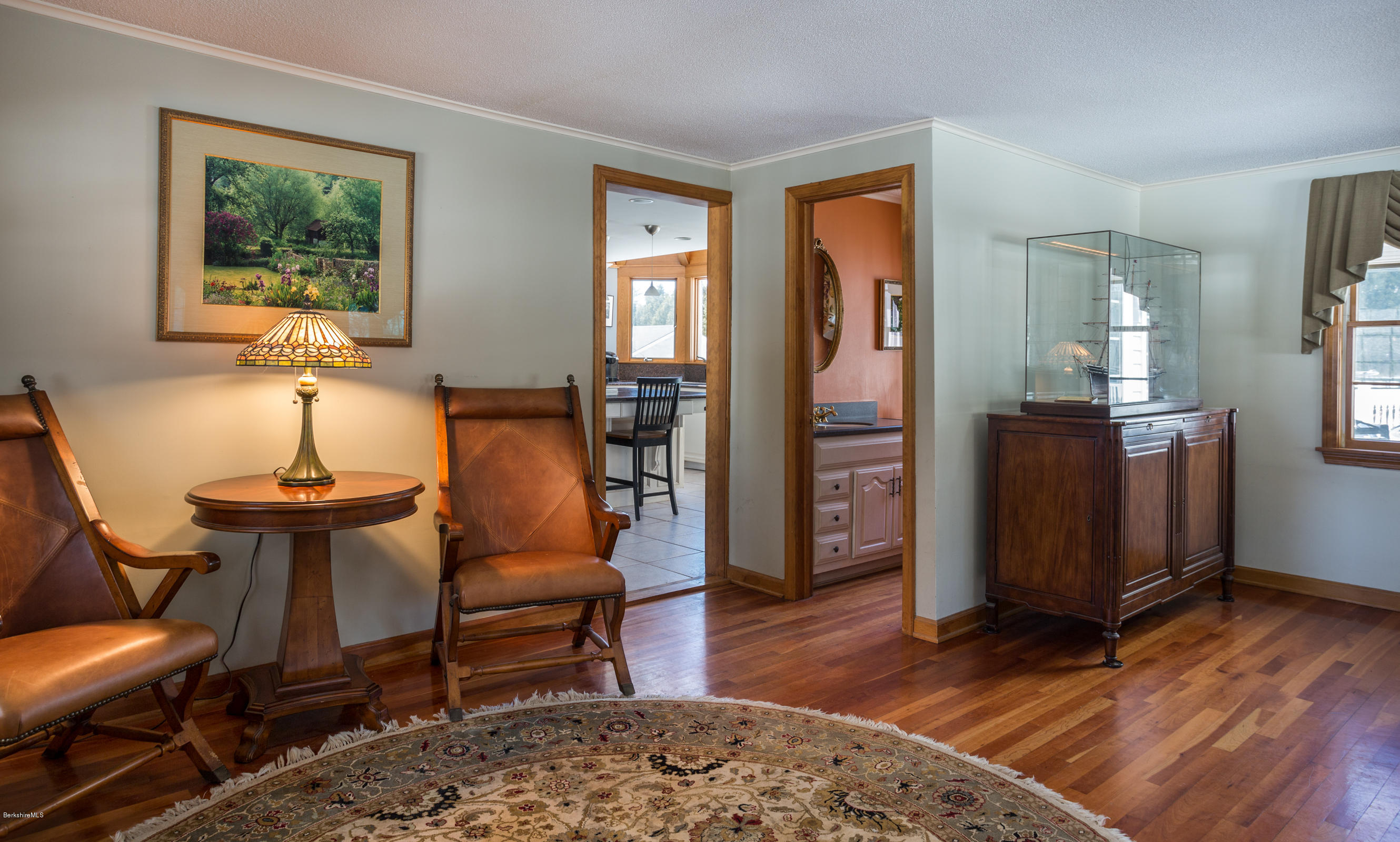 215 Devon Road Lee, MA 01238 - Photo 27 of 59 a living room with furniture and wooden floor