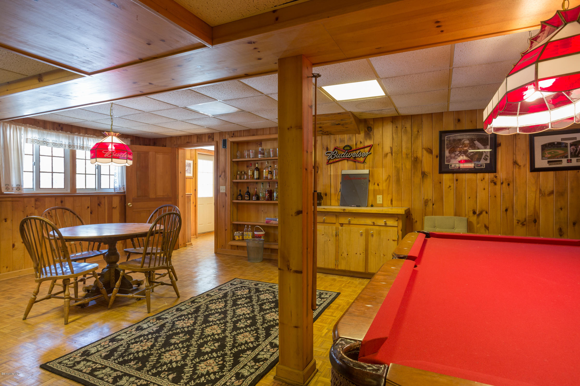 215 Devon Road Lee, MA 01238 - Photo 36 of 59 a dining room with furniture and wooden floor