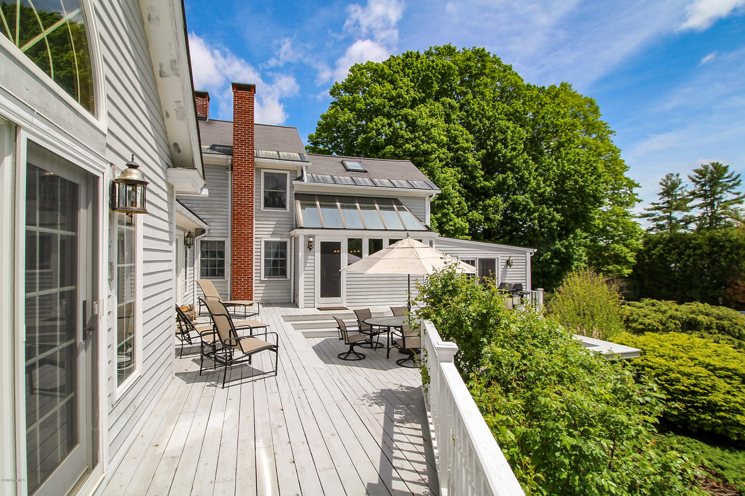 215 Devon Road Lee, MA 01238 - Photo 43 of 59 a view of balcony with furniture and a potted plant