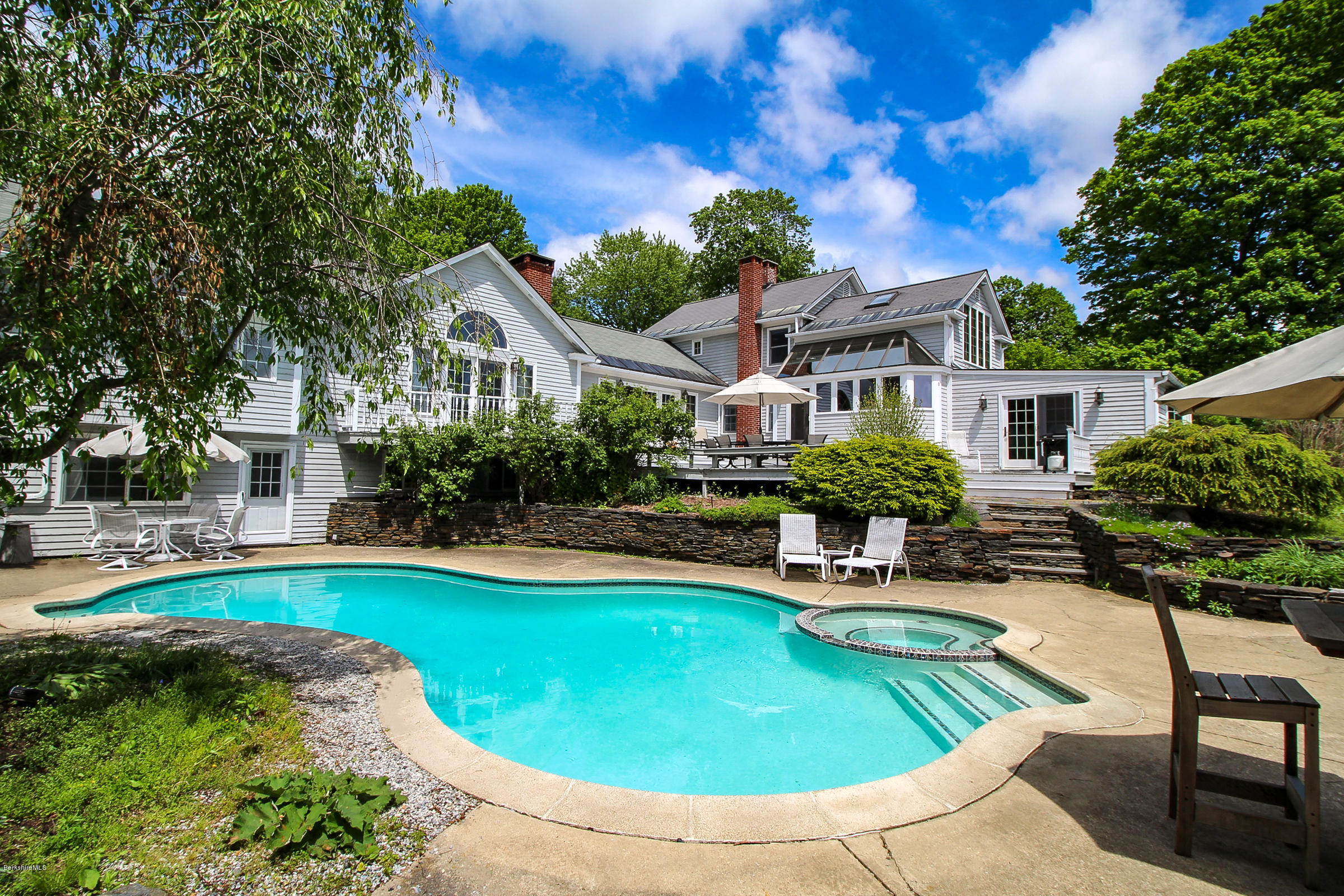 215 Devon Road Lee, MA 01238 - Photo 50 of 59 a view of a house with swimming pool and sitting area