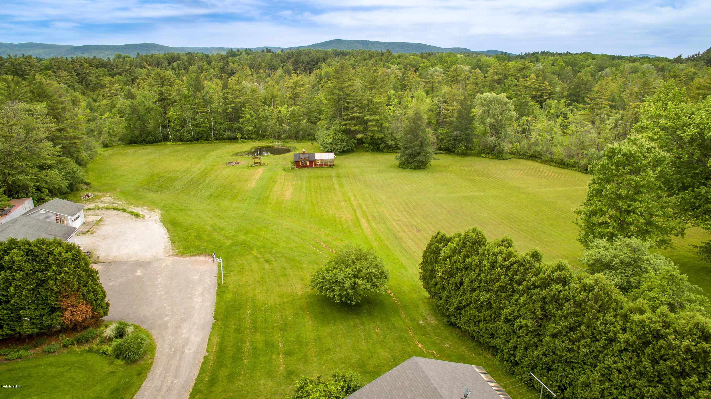 215 Devon Road Lee, MA 01238 - Photo 53 of 59 a view of an outdoor space and a lake view