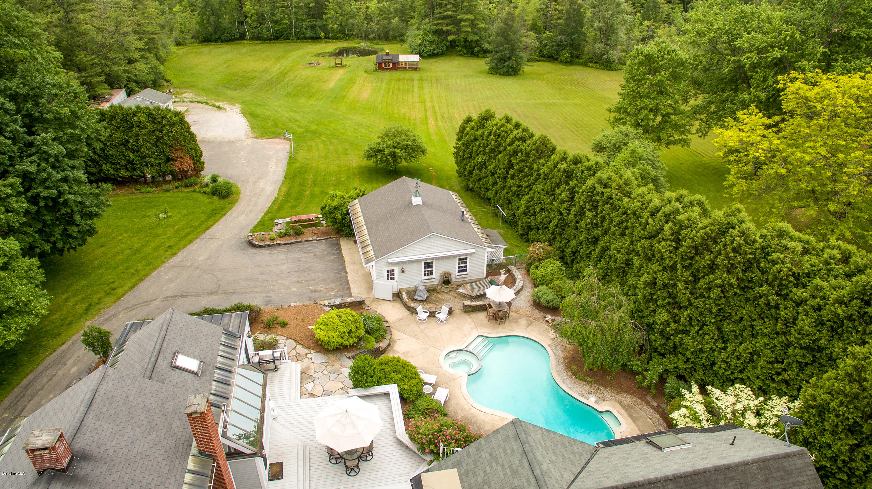 215 Devon Road Lee, MA 01238 - Photo 54 of 59 an aerial view of a house with a ocean view