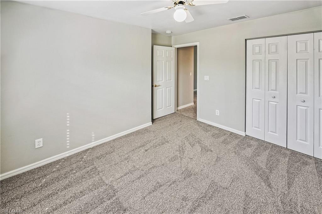 6721 Sloane Place Naples, FL 34104 - Photo 16 of 29 a view of an empty room