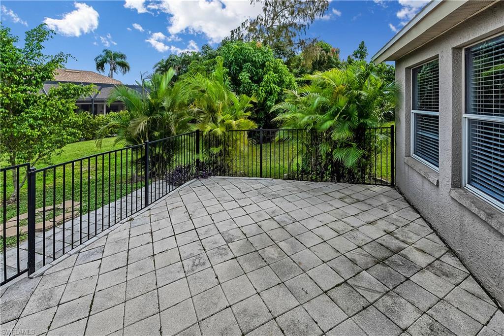 6721 Sloane Place Naples, FL 34104 - Photo 21 of 29 a view of a backyard