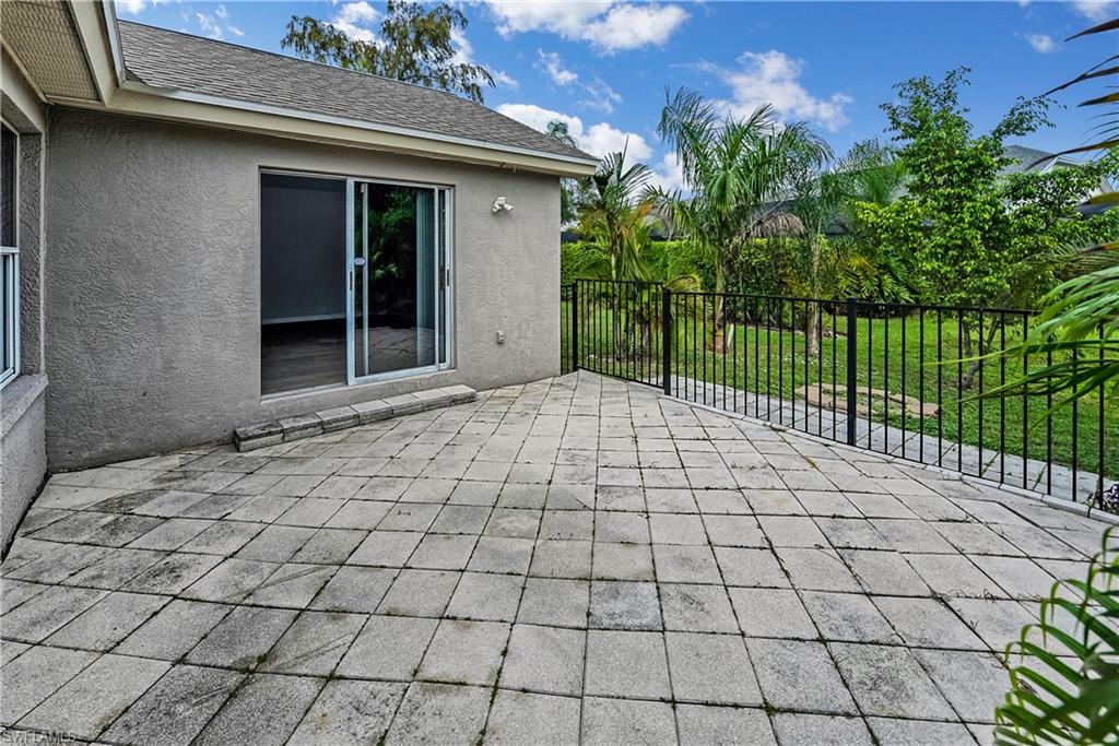 6721 Sloane Place Naples, FL 34104 - Photo 22 of 29 a view of a backyard