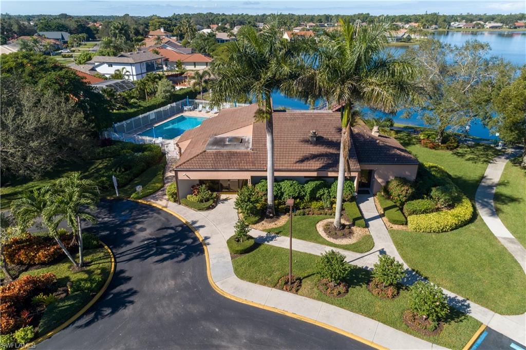 6721 Sloane Place Naples, FL 34104 - Photo 27 of 29 an aerial view of a house with garden space and street view