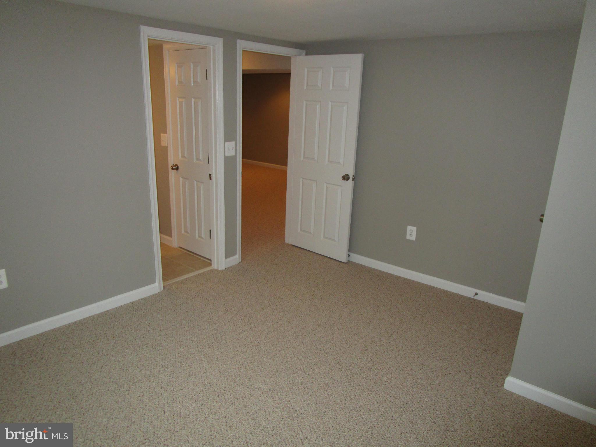 12704 Holdridge Road Silver Spring, MD 20906 - Photo 12 of 22 an empty room with closet area
