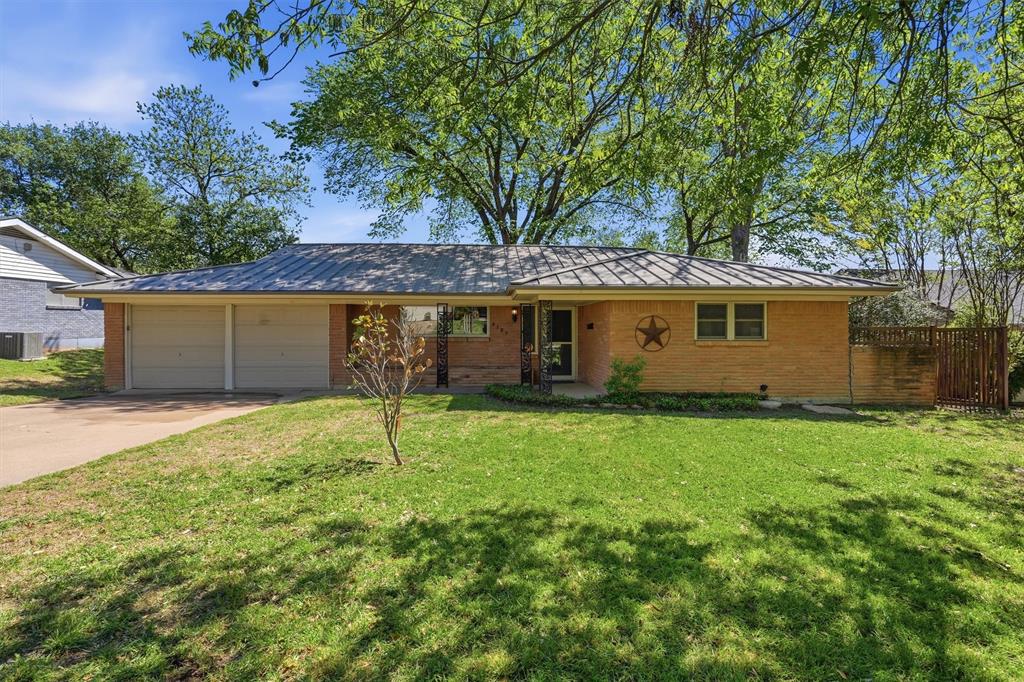 4105 Springbranch Drive Benbrook, TX 76116 - Photo 1 of 27 front view of a house with a yard