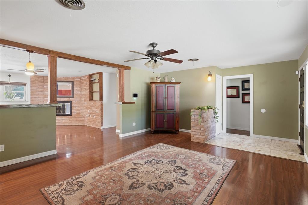 4105 Springbranch Drive Benbrook, TX 76116 - Photo 6 of 27 a living room with furniture and a rug
