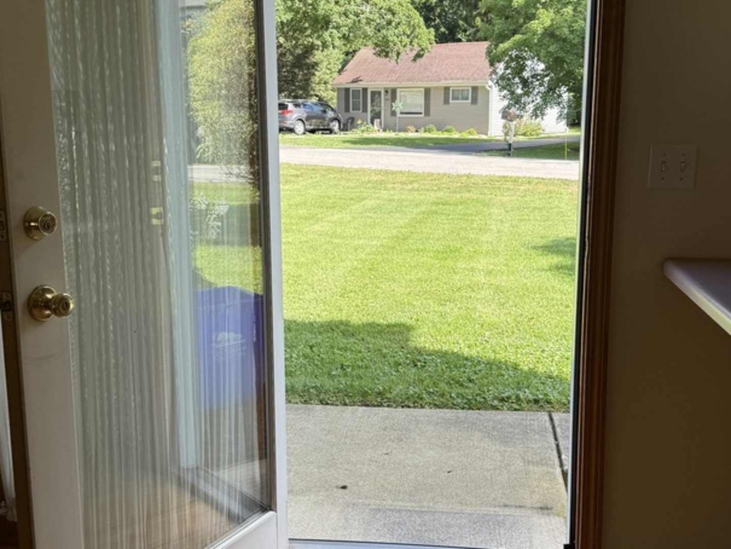 125 Maple Court, Unit 1 Geneva, IL 60134 - Photo 17 of 18 a view of a patio and a yard