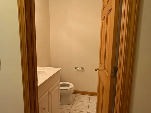a bathroom with a toilet and a sink