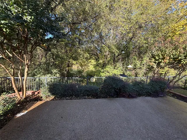 a view of a street with a trees