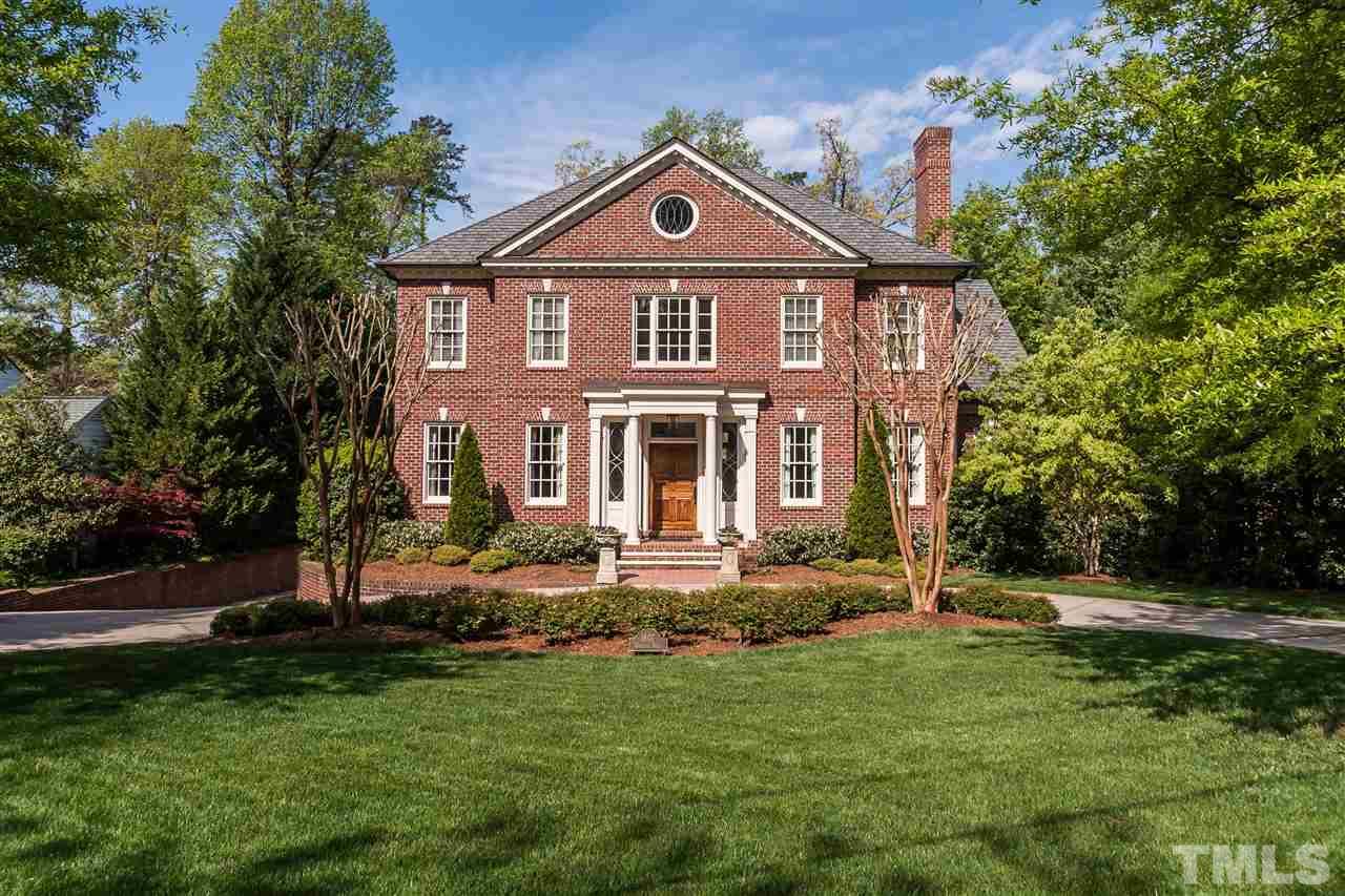 1807 Chester Road Raleigh, NC 27608 - Photo 1 of 25 a front view of a house with a yard