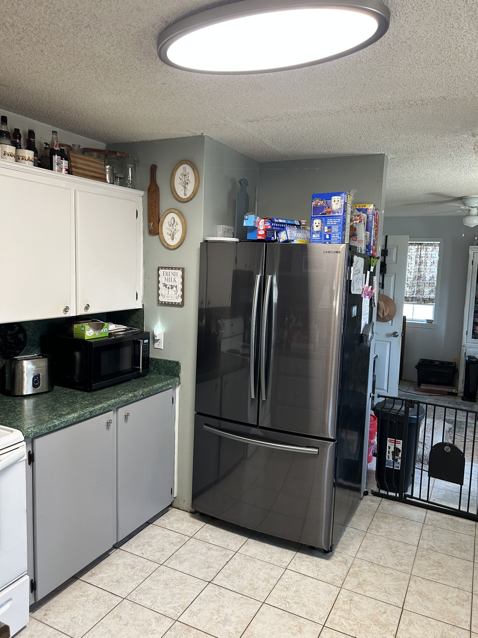2023 Wayland Springs Road Iron City, TN 38463 - Photo 22 of 45 a kitchen with stainless steel appliances granite countertop a refrigerator and a sink