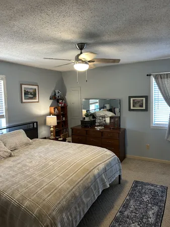 a view of kitchen with stainless steel appliances granite countertop a sink and a stove