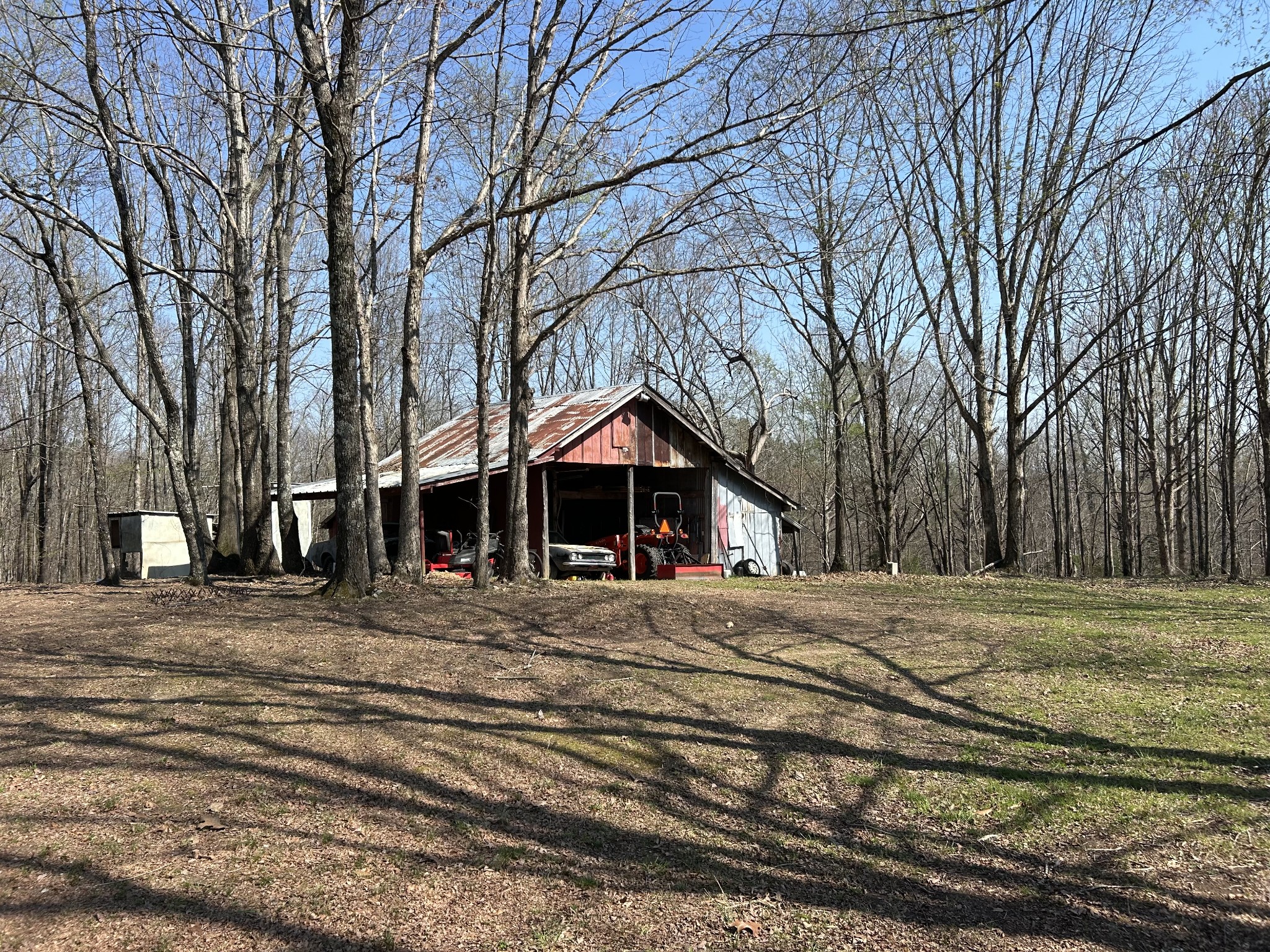 2023 Wayland Springs Road Iron City, TN 38463 - Photo 30 of 45 a big house with trees in the background