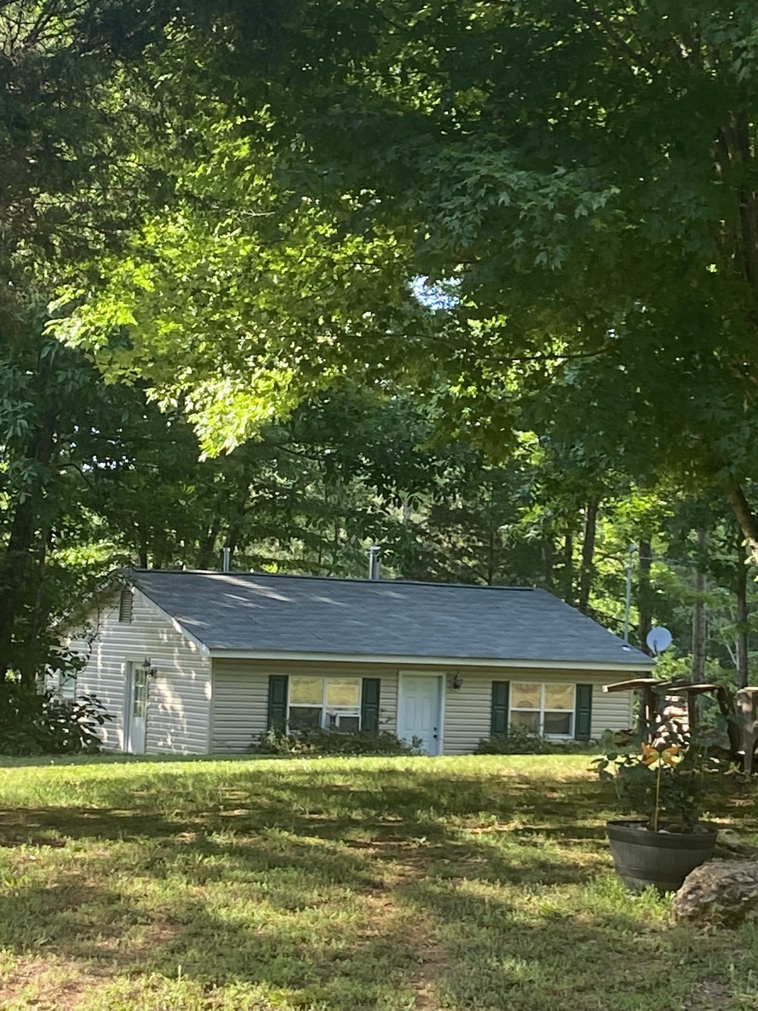 2023 Wayland Springs Road Iron City, TN 38463 - Photo 33 of 45 a front view of a house with a garden