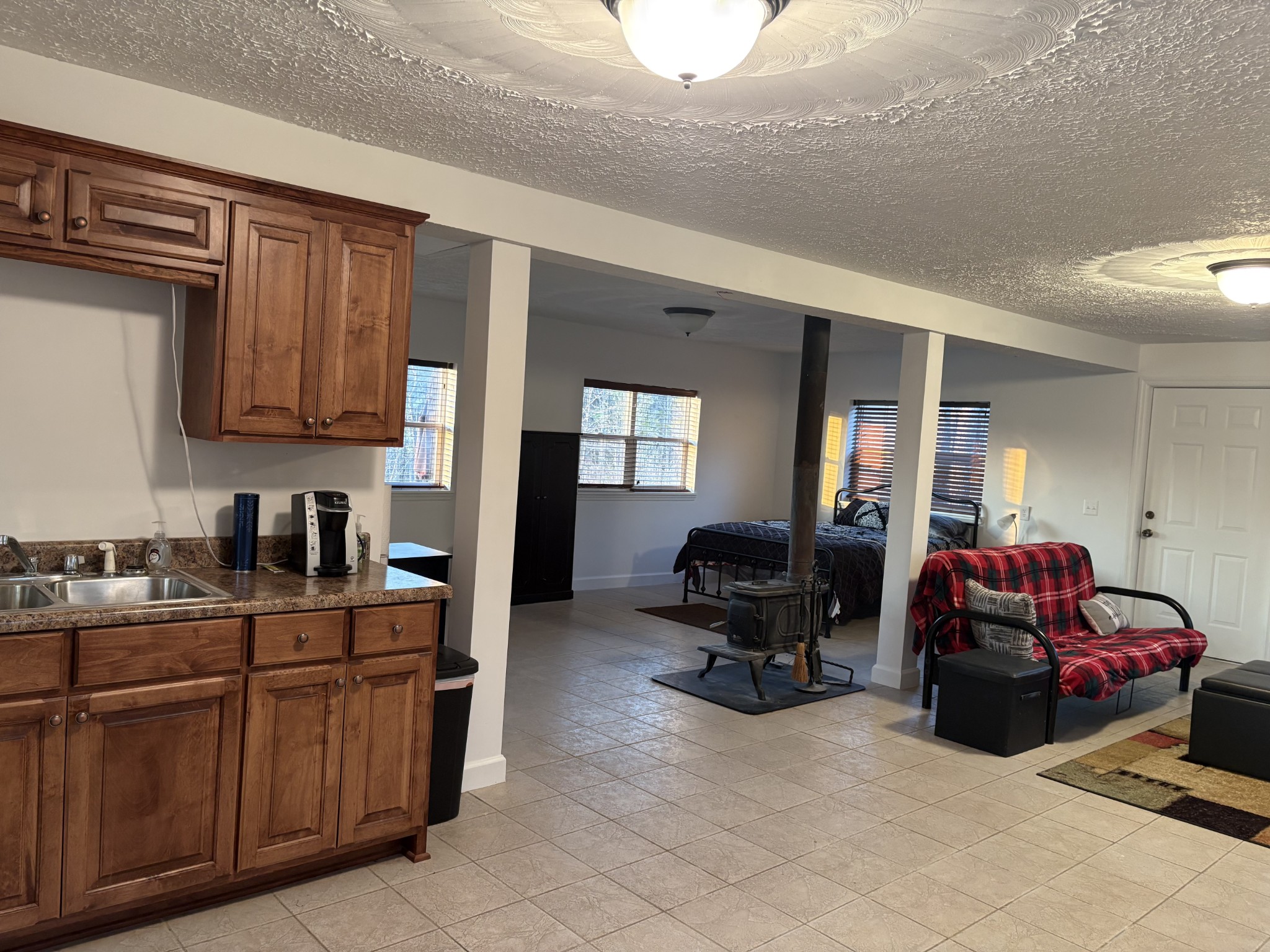 2023 Wayland Springs Road Iron City, TN 38463 - Photo 38 of 45 a living room with furniture cabinets and a window