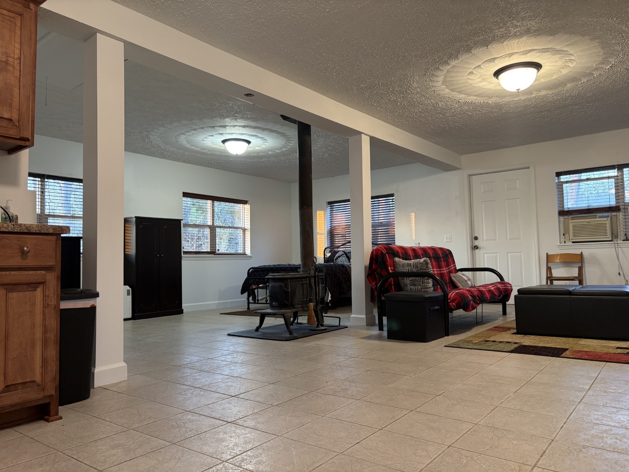 2023 Wayland Springs Road Iron City, TN 38463 - Photo 42 of 45 a living room with furniture and a refrigerator