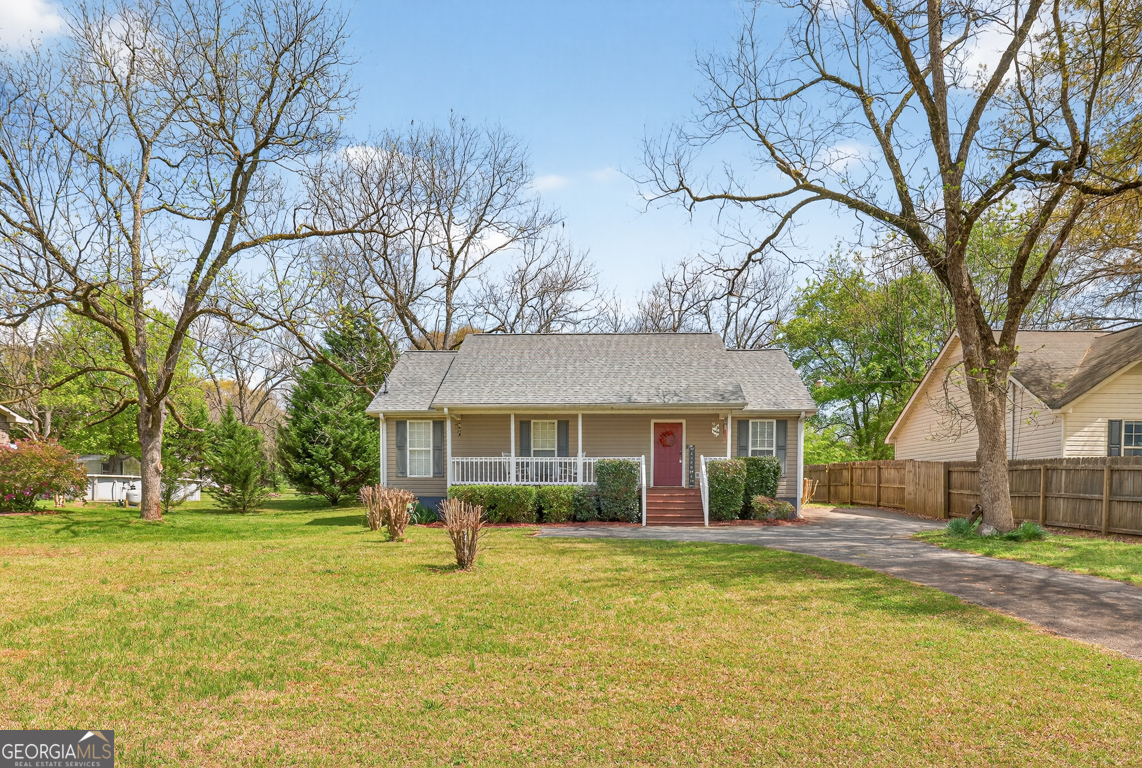141 Pope Street Zebulon, GA 30295 - Photo 1 of 42 a front view of house with yard and green space